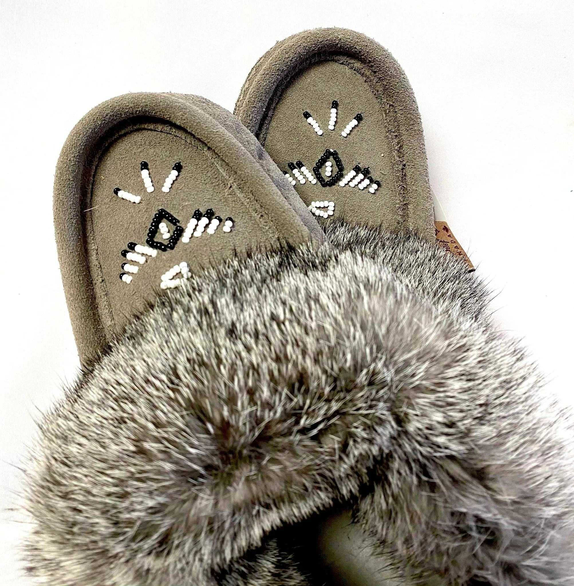 Laurentian Chief Ladies Fur Trimmed Moccasins Thunderbird Beaded Pattern